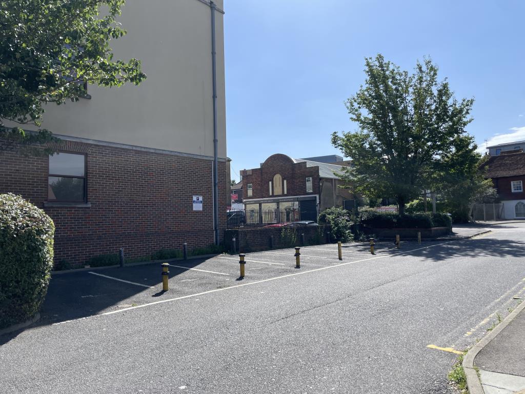 Lot: 169 - EIGHT CAR PARKING SPACES IN TOWN CENTRE - View of eight car parking spaces